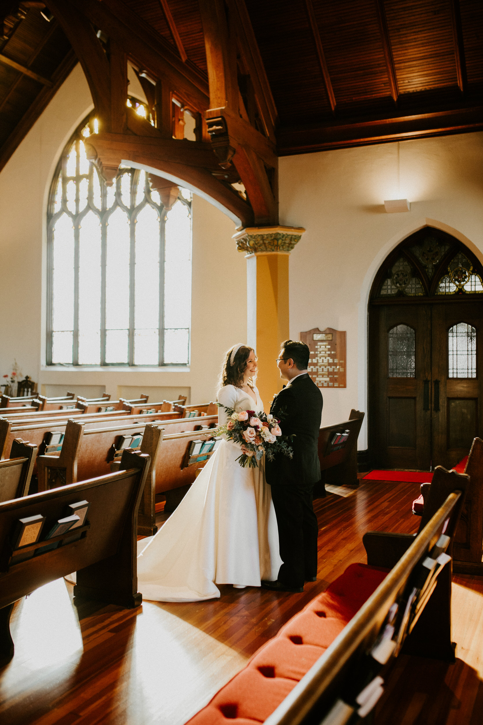 portrait of bride and groom in church