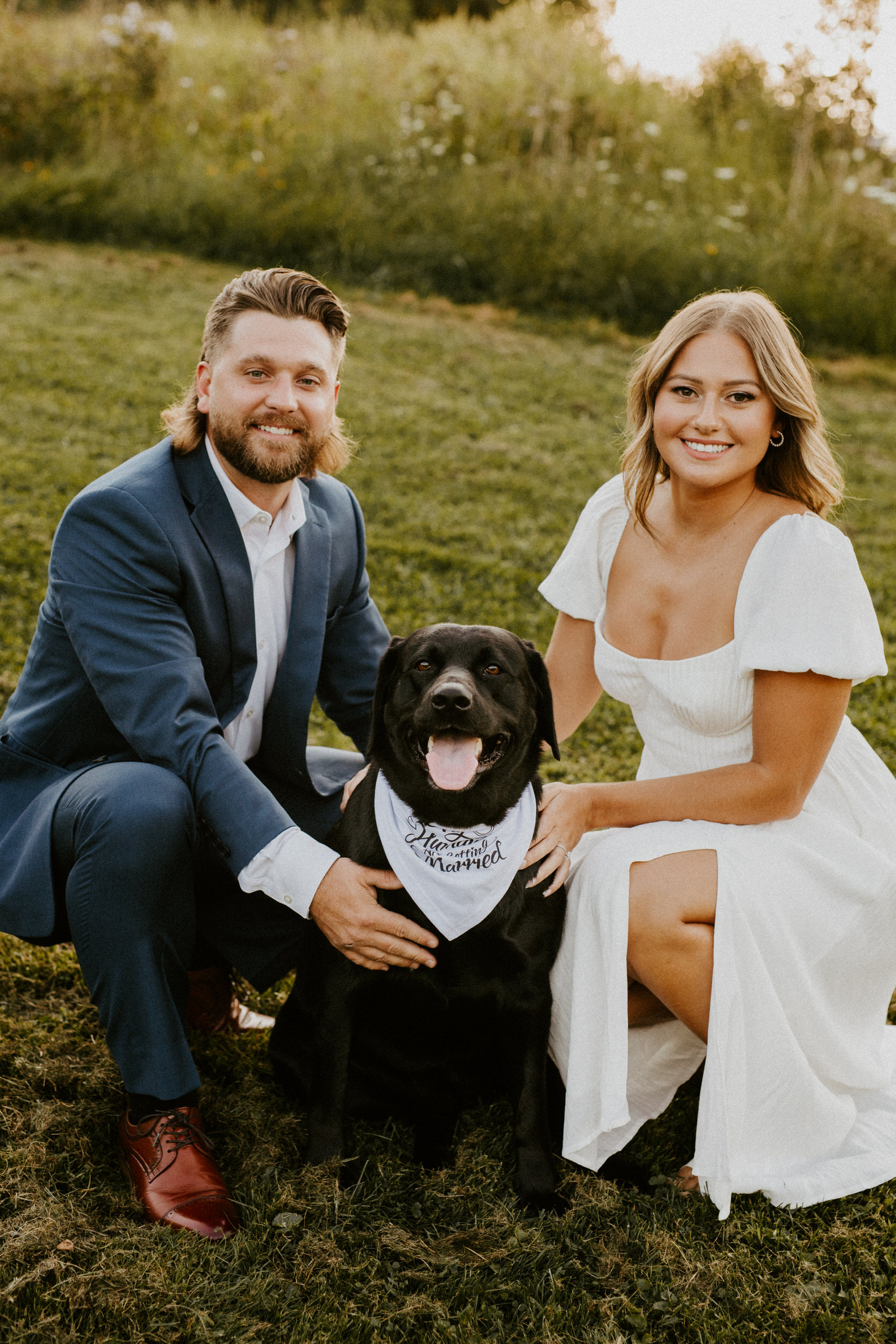 couple with their dog engagement session