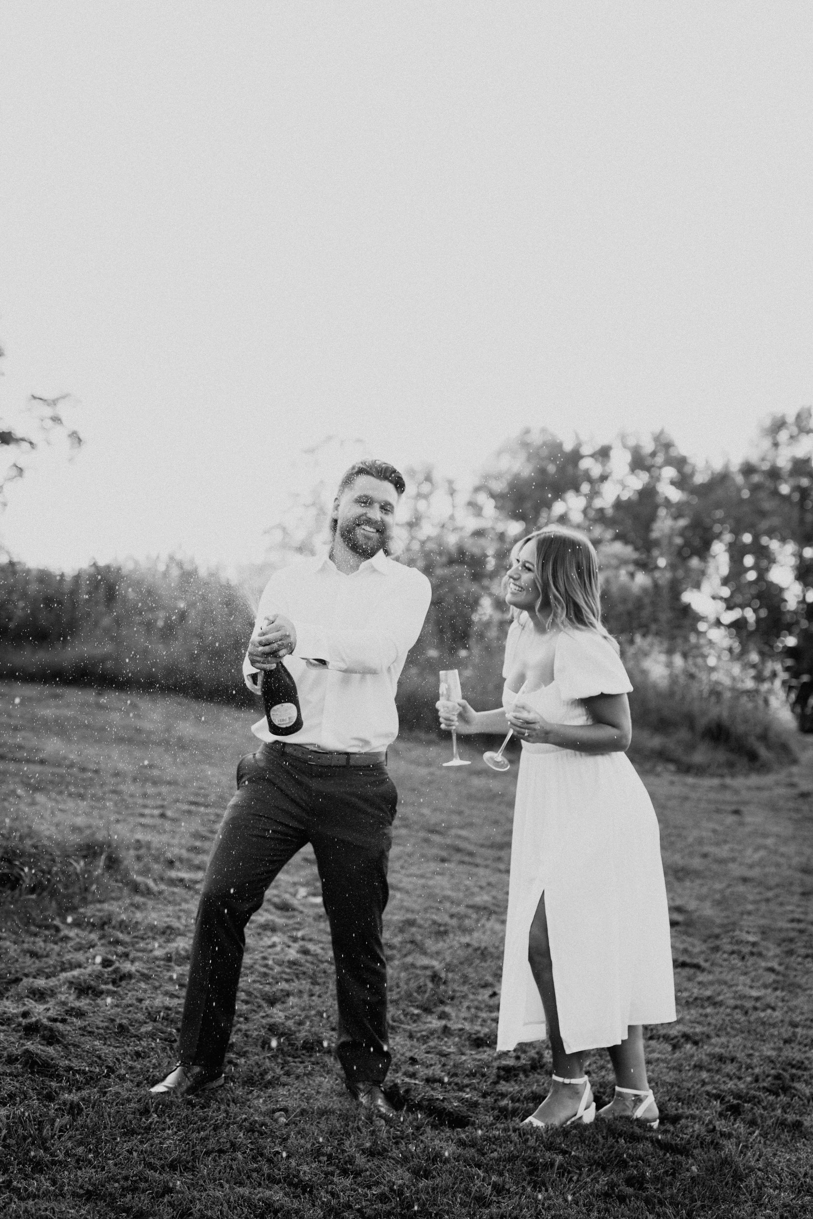 champagne pop engagement session pictures